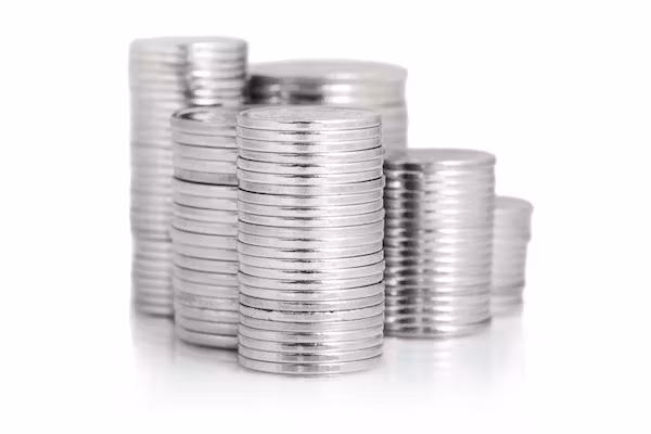 Multiple Silver Coins Stacked